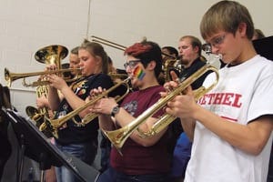 Bethel senior Abby Phillips, second from right, joined students from Haven High School to form a pep band, under the direction of Brad Shores, for the Bethel-Tabor basketball game last February.