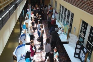 A display of student research set up in the Will Academic Center atrium this past spring as part of the URICA Symposium.