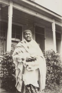 Ape Walker, an elderly Cheyenne woman, in front of the home of J.B. and Agatha (Regier) Ediger, Clinton, Oklahoma, ca. 1935