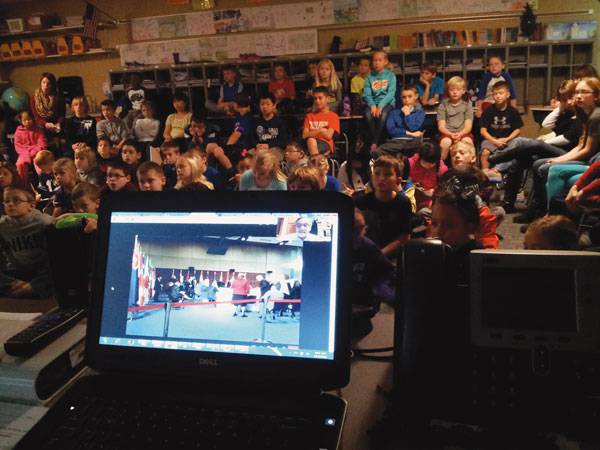 Fourth-graders from Wheatland Elementary School in Andover Skype® Dec. 4, 2014, with Larry Fisher, the Indonesian diplomatic interpreter for the U.S. State Department, about his trip to Asia with President Obama earlier that fall.