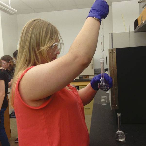 Amber Schmidt-Hayes in a chemistry lab at the University of North Texas in Denton. “I know research is a definite possibility for me,” she says.