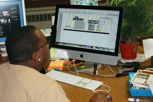 Da’Ron Gillis works on his final project for Graphic Design I—designing a logo and branding campaign for his family’s construction company.