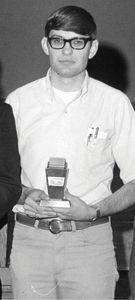 Dale Schrag in 1969 receiving his Thresher Award in history.  Photo provided by the Mennonite Library & Archives.