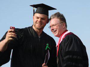 Trever Ford takes a selfie with the president.  Photo by Vada Snider.